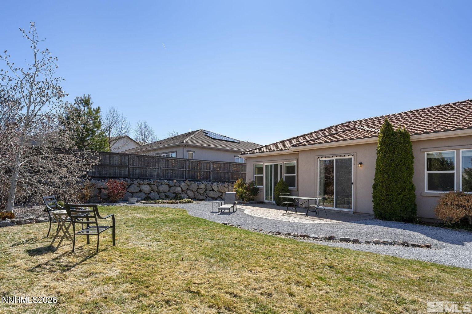 735 Sienna Park Drive Reno, NV 89512 - Photo 22 of 24 a view of a house with swimming pool and sitting area