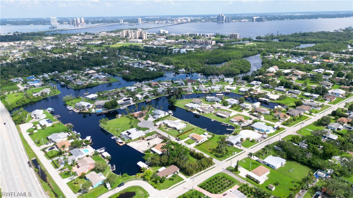 1192 Moody Road North Fort Myers, FL 33903 - Photo 2 of 29 an aerial view of a city
