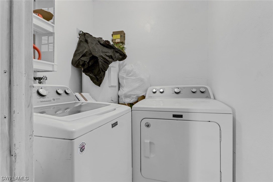 1192 Moody Road North Fort Myers, FL 33903 - Photo 25 of 29 a utility room with dryer and washer