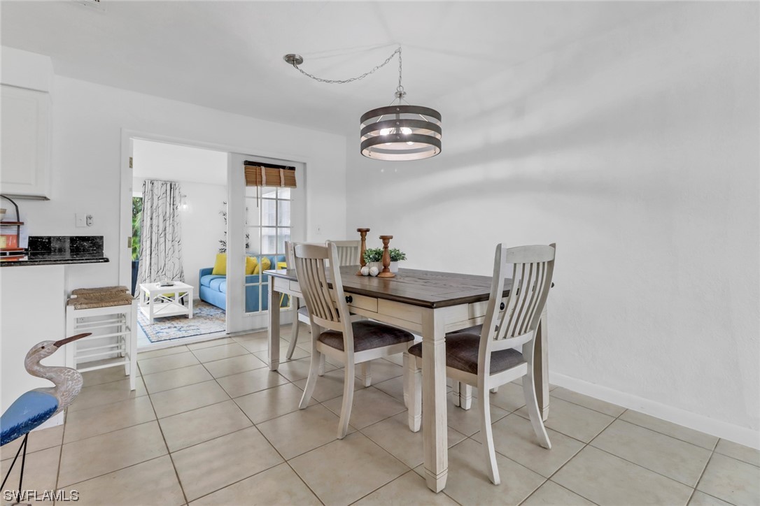 1192 Moody Road North Fort Myers, FL 33903 - Photo 9 of 29 a view of a dining room with furniture