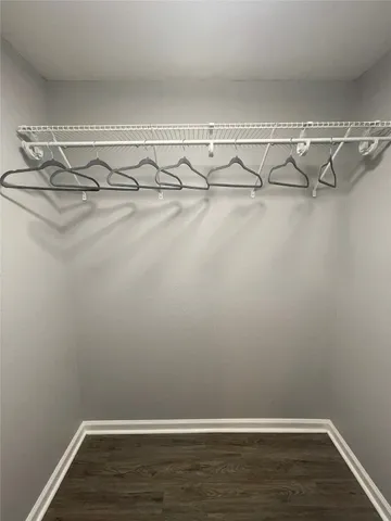 a view of a room with racks on the wall