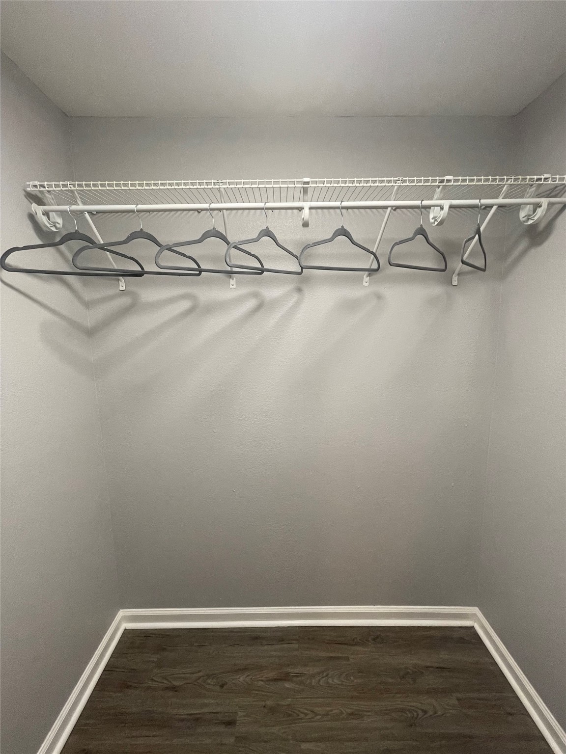 1225 West 25th Street, Unit 2 Houston, TX 77008 - Photo 3 of 6 a view of a room with racks on the wall