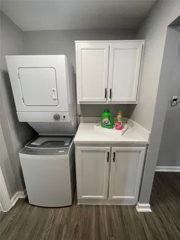 a utility room with washer and dryer