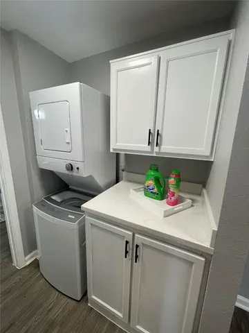 a utility room with washer and dryer