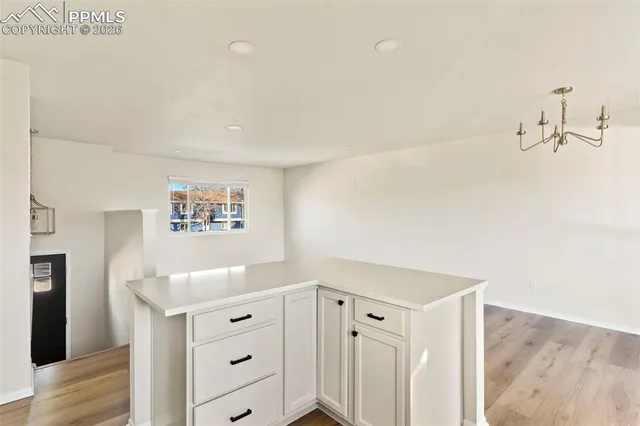 a view of a hallway with closet