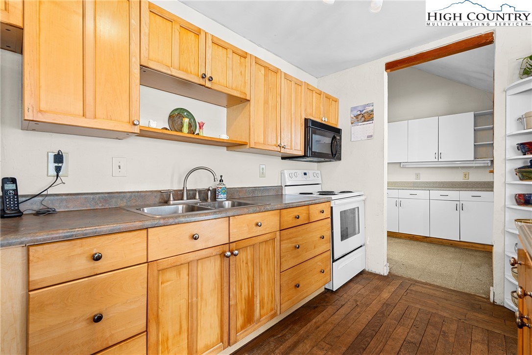 1355 Pine Run Road Boone, NC 28607 - Photo 11 of 37 a kitchen with sink cabinets and window