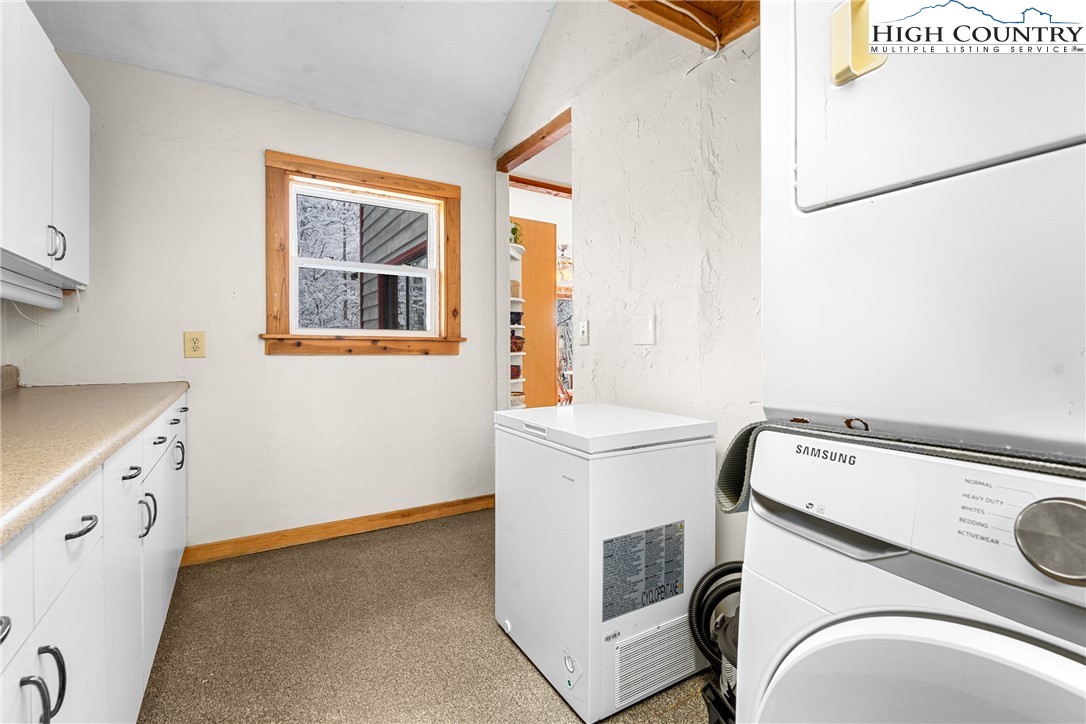 1355 Pine Run Road Boone, NC 28607 - Photo 21 of 37 a utility room with dryer and washer