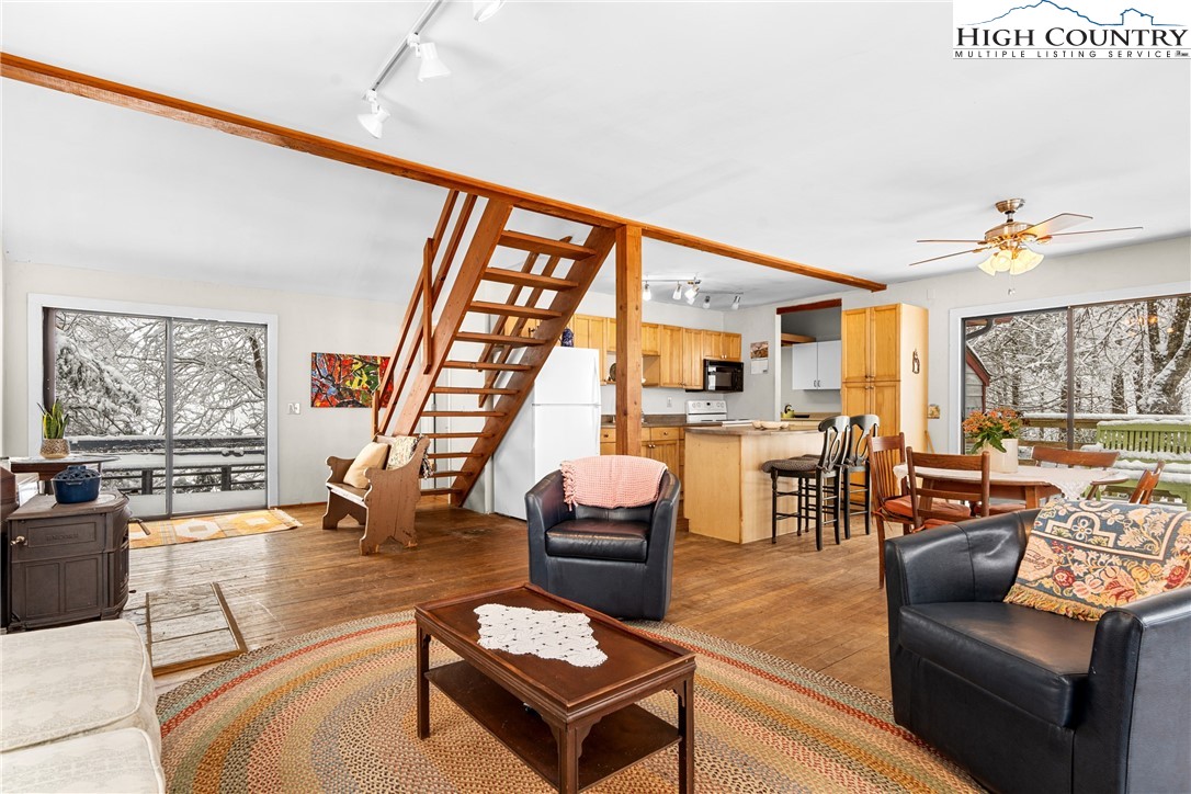 1355 Pine Run Road Boone, NC 28607 - Photo 5 of 37 a living room with furniture and a large window