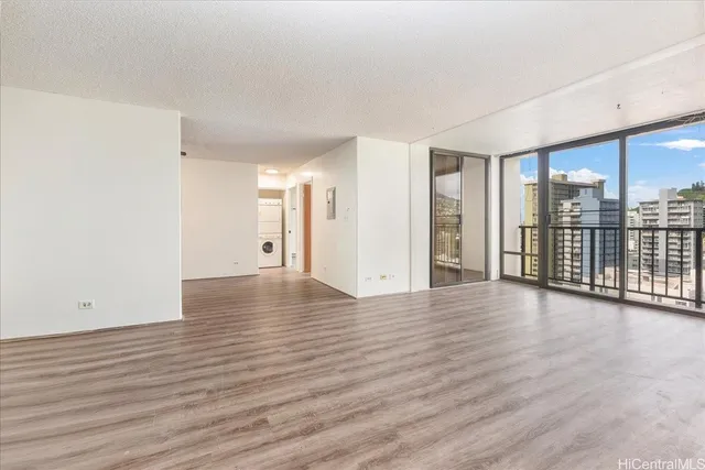 a view of a livingroom with wooden floor