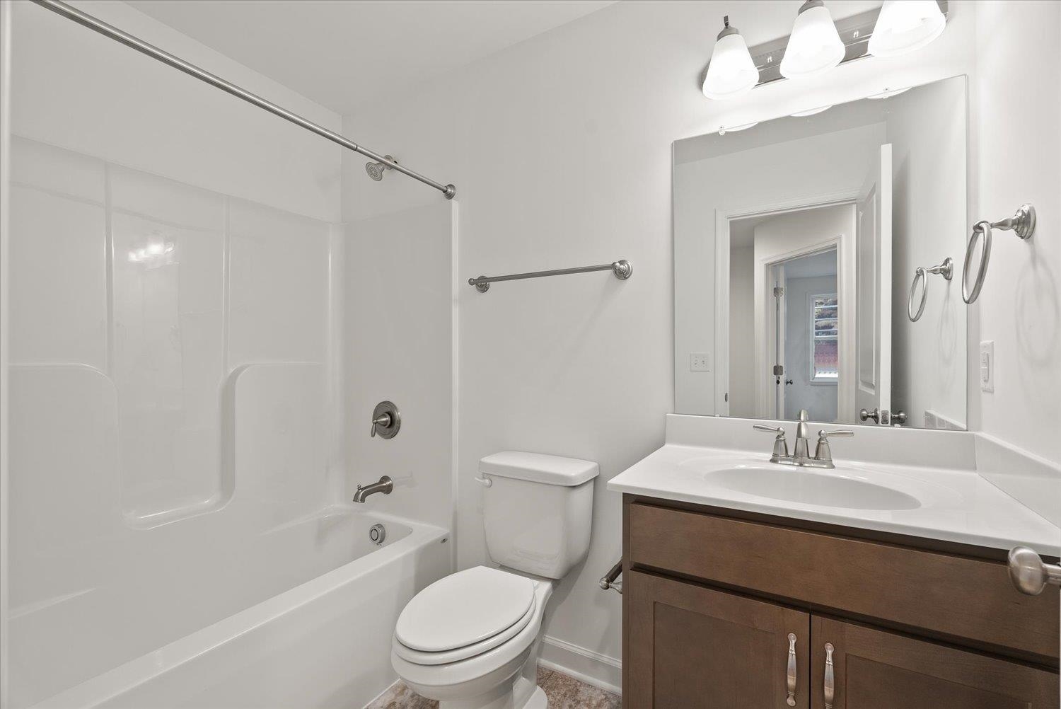 Lot 8 Middlebrook Avenue Staunton, VA 24401 - Photo 20 of 39 a bathroom with a sink a toilet and shower
