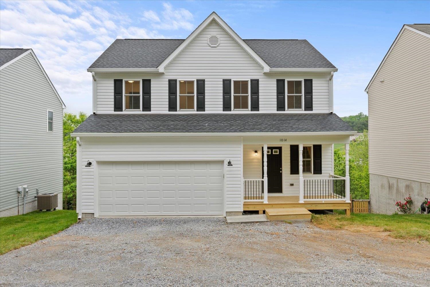Lot 8 Middlebrook Avenue Staunton, VA 24401 - Photo 2 of 39 a front view of a house with a yard and garage