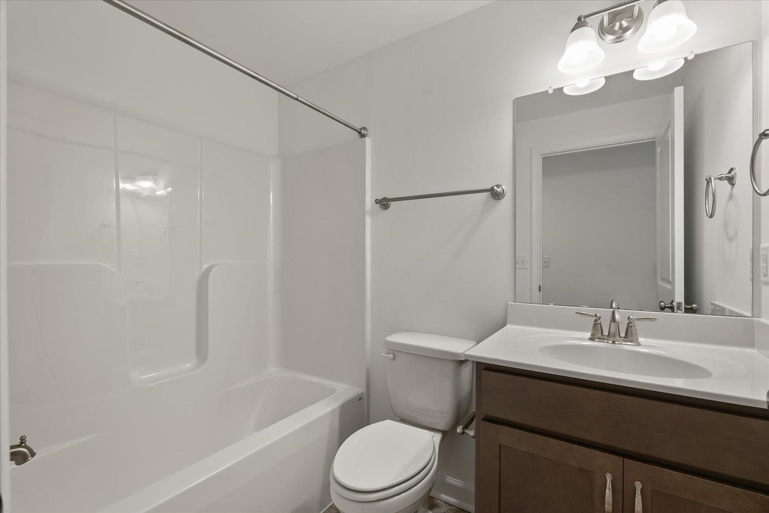 Lot 8 Middlebrook Avenue Staunton, VA 24401 - Photo 28 of 39 a bathroom with a sink a toilet and shower