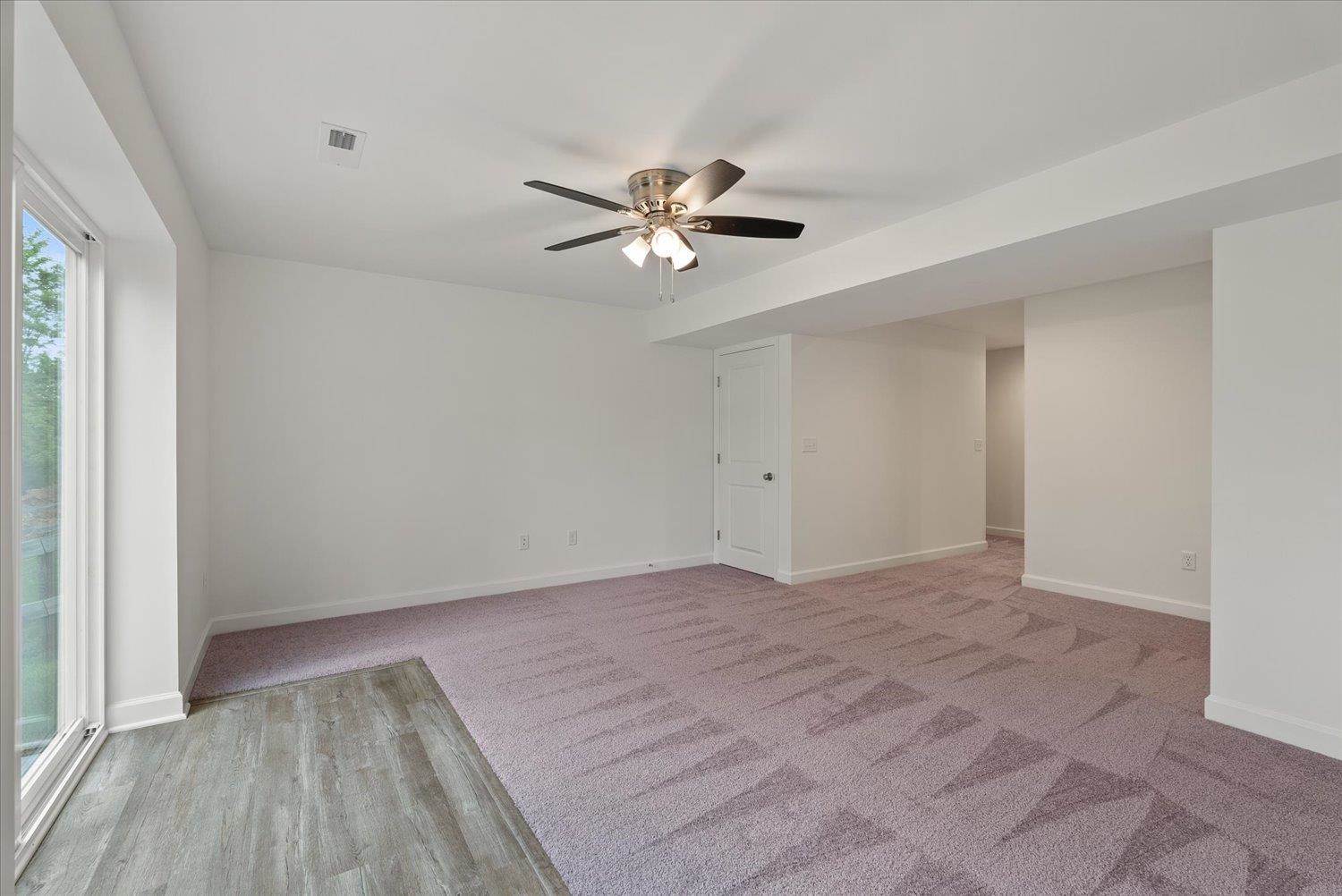 Lot 8 Middlebrook Avenue Staunton, VA 24401 - Photo 30 of 39 wooden floor in an empty room with a window