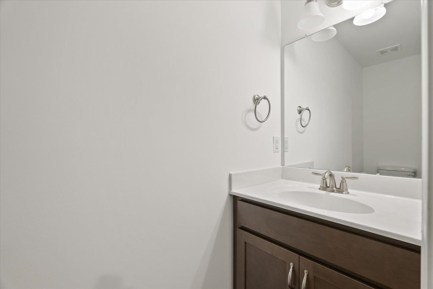 Lot 8 Middlebrook Avenue Staunton, VA 24401 - Photo 7 of 39 a bathroom with a sink and vanity