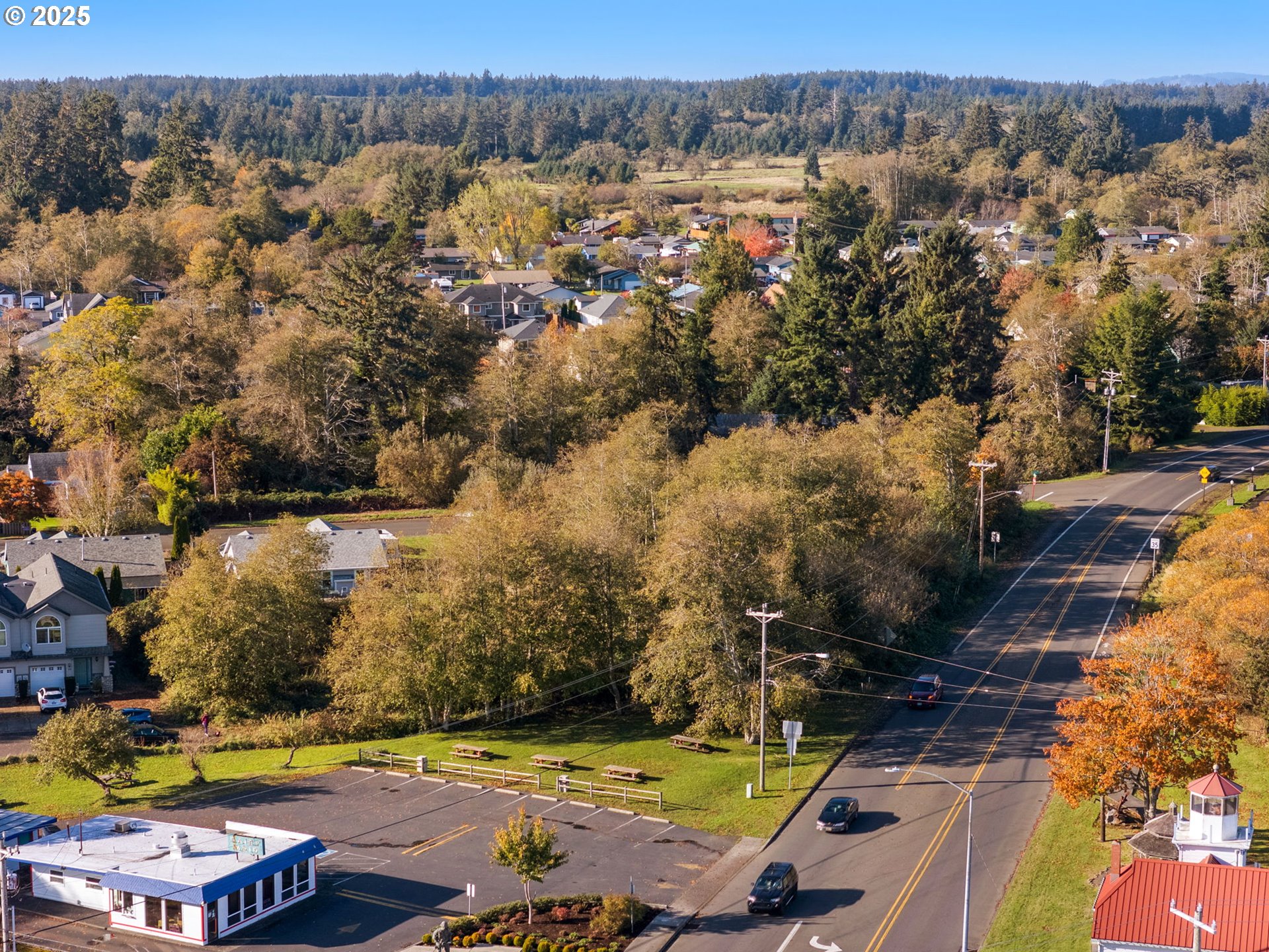 59 Southwest Main Court Warrenton, OR 97146 - Photo 4 of 9 an aerial view of residential houses with outdoor space