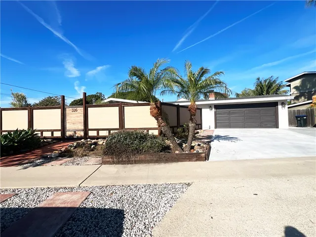 a view of a house with a patio