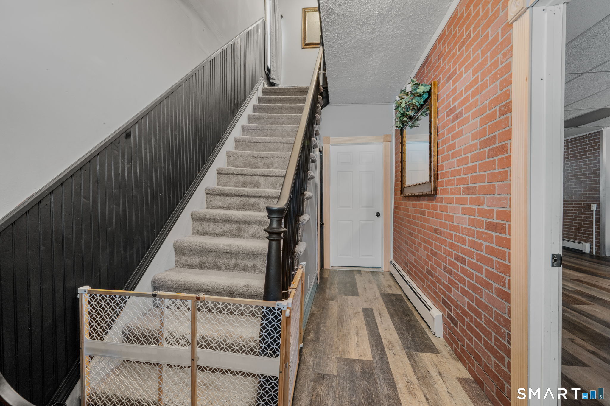 232 Franklin Street Norwich, CT 06360 - Photo 24 of 40 a view of entryway with wooden floor