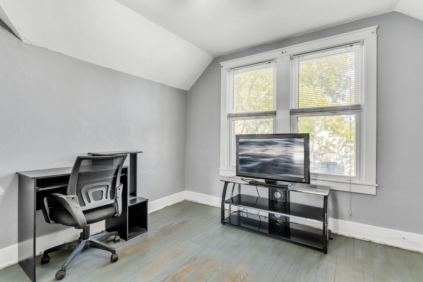 5402 South 73rd Avenue Summit, IL 60501 - Photo 15 of 17 a view of workspace with wooden floor and windows