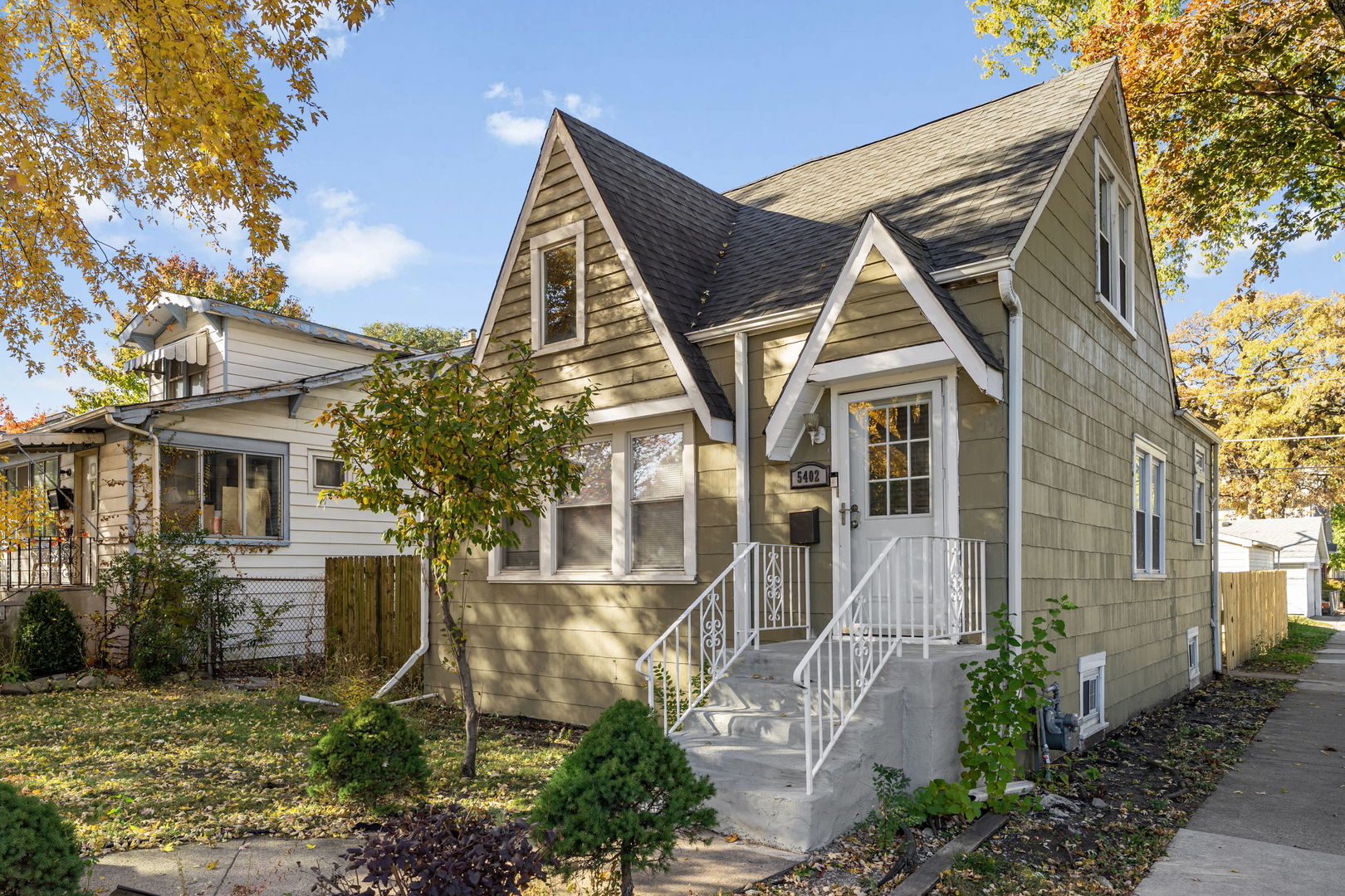 5402 South 73rd Avenue Summit, IL 60501 - Photo 2 of 17 a view of a white house next to a yard
