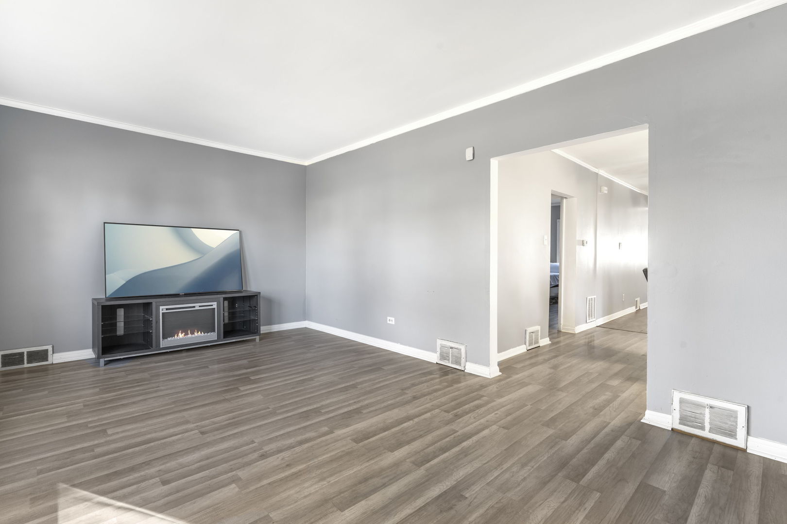 5402 South 73rd Avenue Summit, IL 60501 - Photo 5 of 17 a view of an empty room with wooden floor
