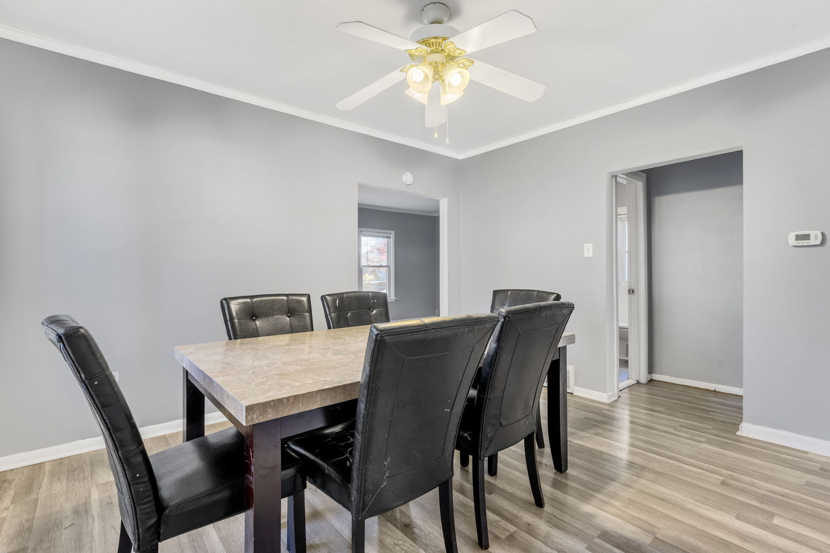 5402 South 73rd Avenue Summit, IL 60501 - Photo 7 of 17 a view of a dining room with furniture and wooden floor