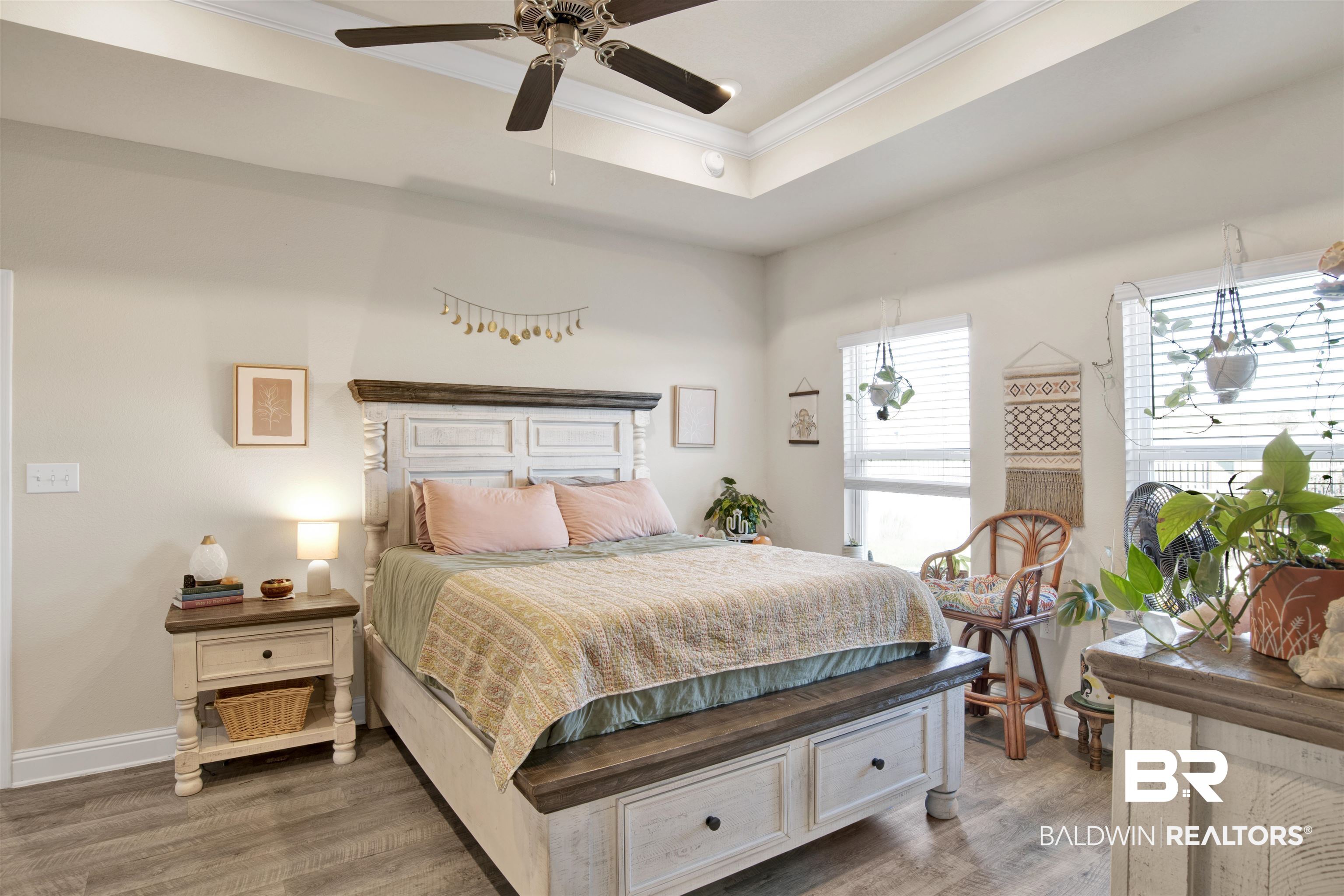 9622 Volterra Avenue Daphne, AL 36526 - Photo 17 of 31 Bedroom with a raised ceiling, ceiling fan, crown molding, and wood-type flooring
