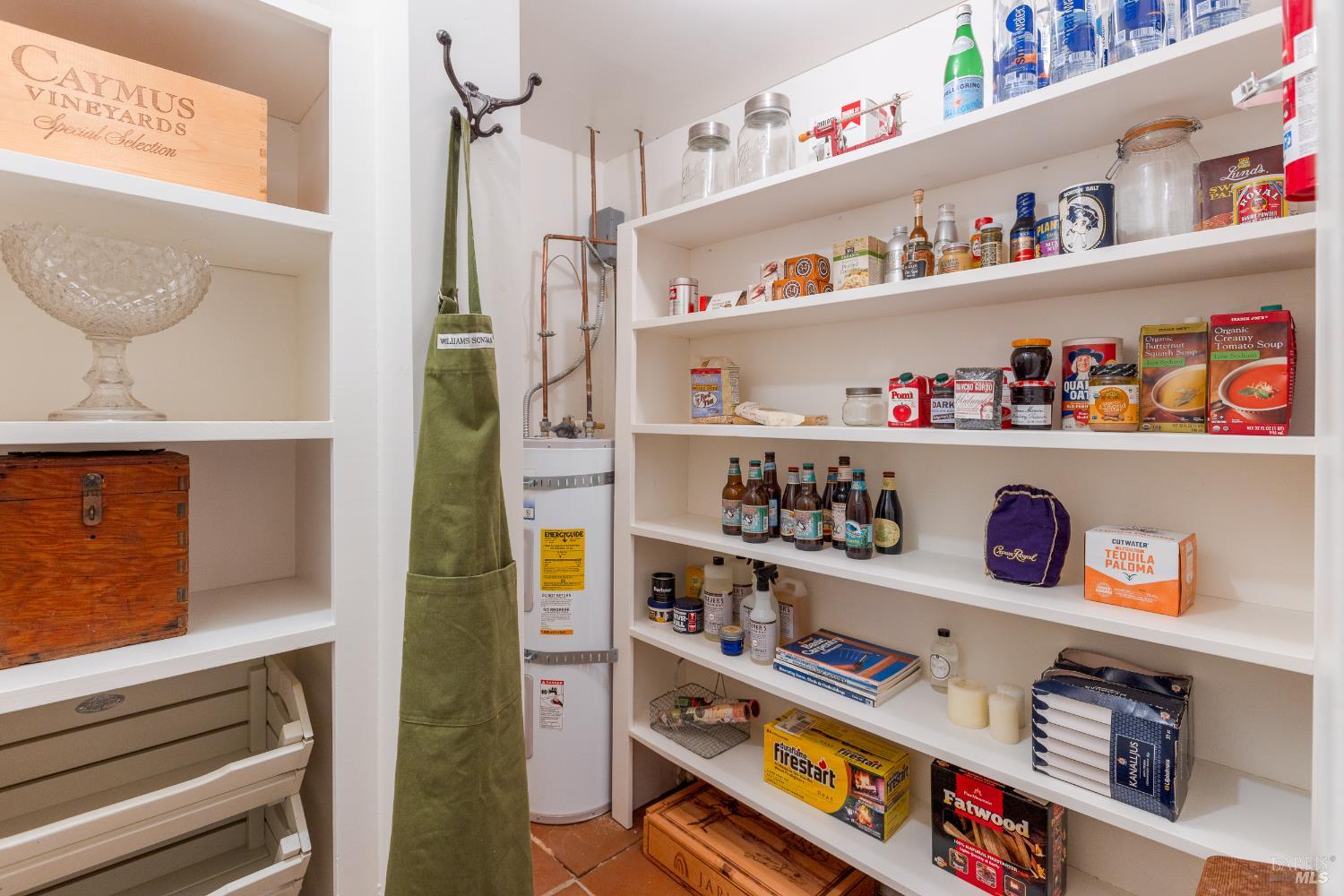 1760 Howell Mountain Road Angwin, CA 94508 - Photo 17 of 31 a cabinet with food and a kitchen view