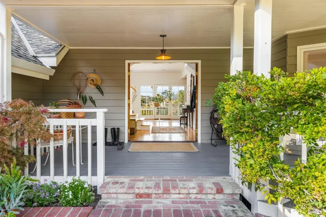 a front view of a house with a porch