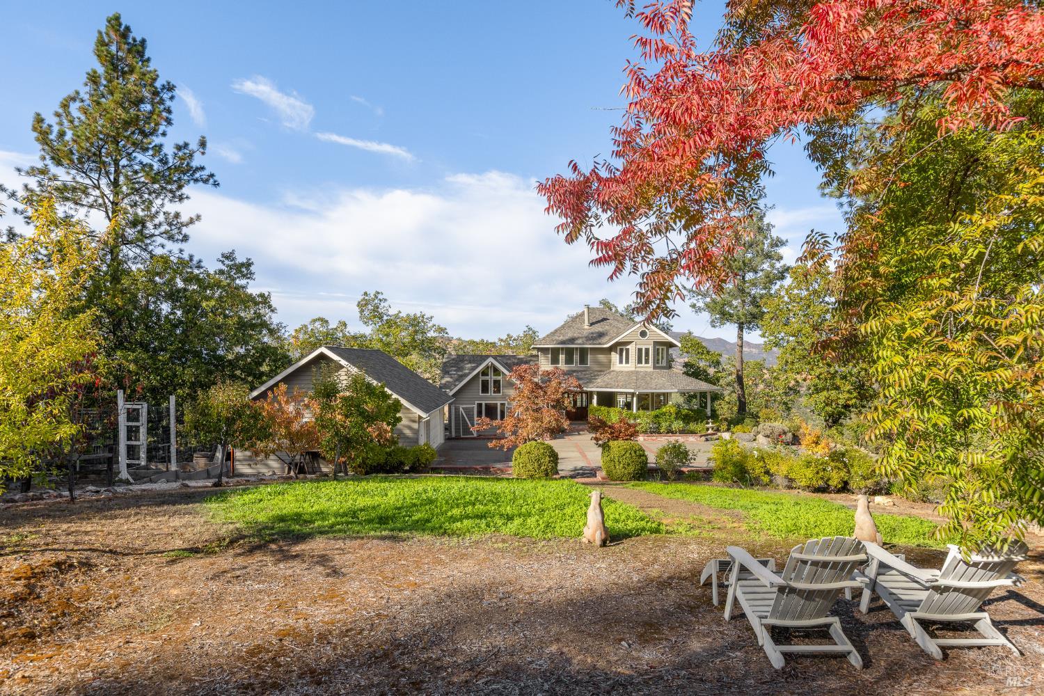1760 Howell Mountain Road Angwin, CA 94508 - Photo 31 of 31 a view of a park with table and chairs under an umbrella