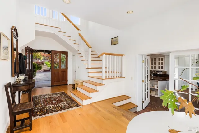 a bedroom with furniture and a window