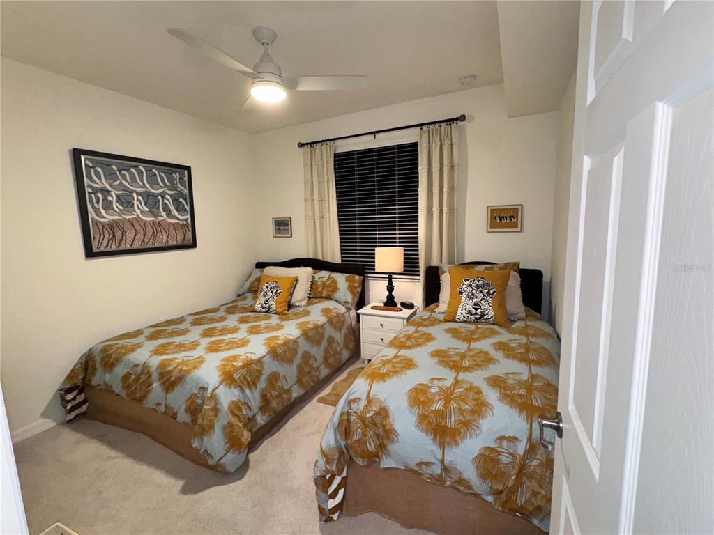 17724 Gawthrop Drive, Unit 304 Bradenton, FL 34211 - Photo 15 of 38 a bedroom with bed and window