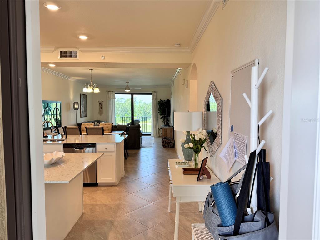 17724 Gawthrop Drive, Unit 304 Bradenton, FL 34211 - Photo 2 of 38 a view of a kitchen and dining room