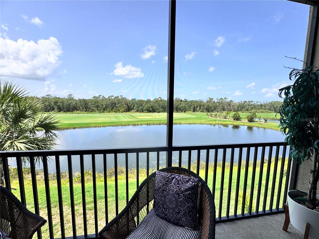 17724 Gawthrop Drive, Unit 304 Bradenton, FL 34211 - Photo 29 of 38 a view of a balcony with lake and mountain view