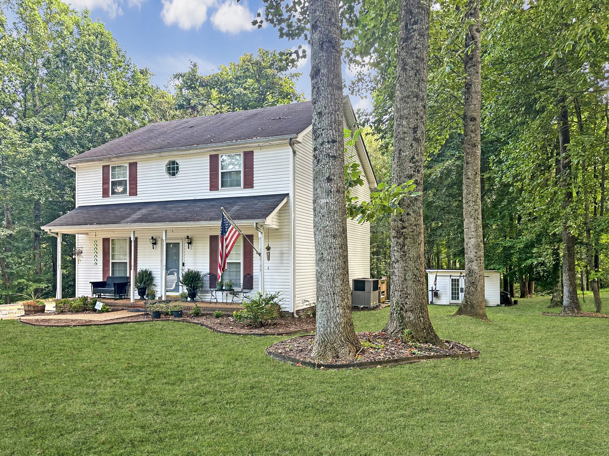 1016 Keyway Drive Pleasant View, TN 37146 - Photo 1 of 30 a view of a house with a yard patio and fire pit