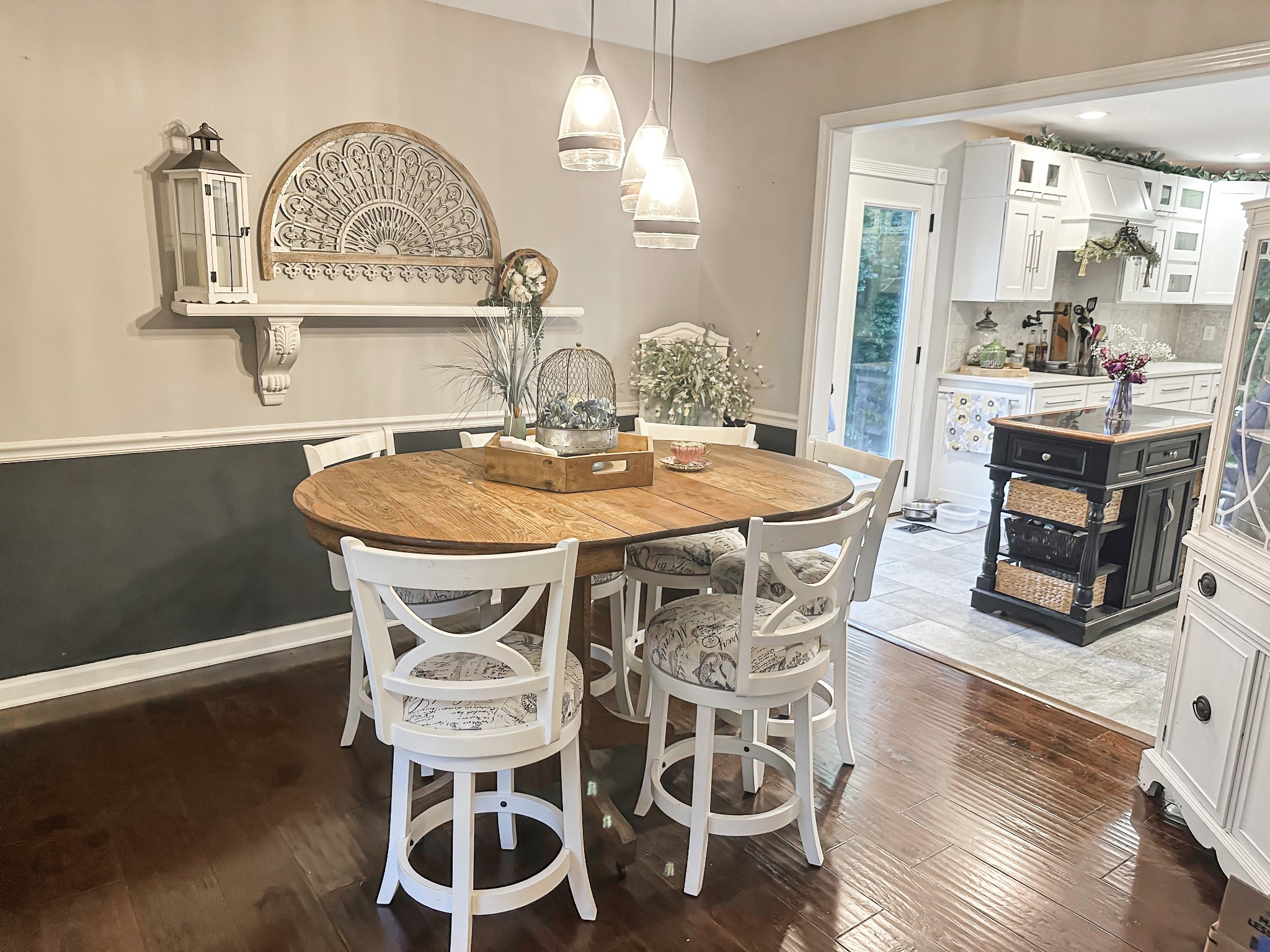1016 Keyway Drive Pleasant View, TN 37146 - Photo 15 of 30 a dining room with furniture a chandelier and wooden floor