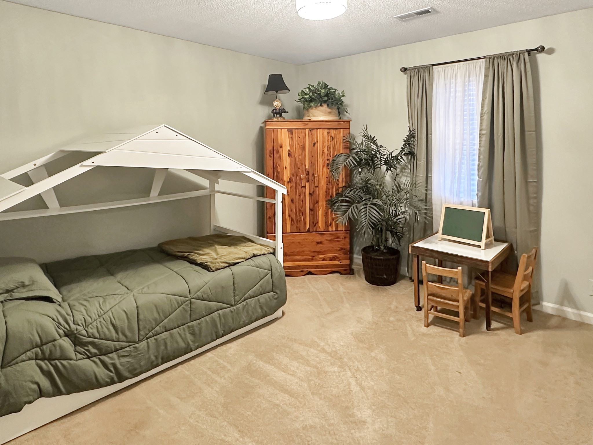 1016 Keyway Drive Pleasant View, TN 37146 - Photo 23 of 30 a bedroom with a bed and a window