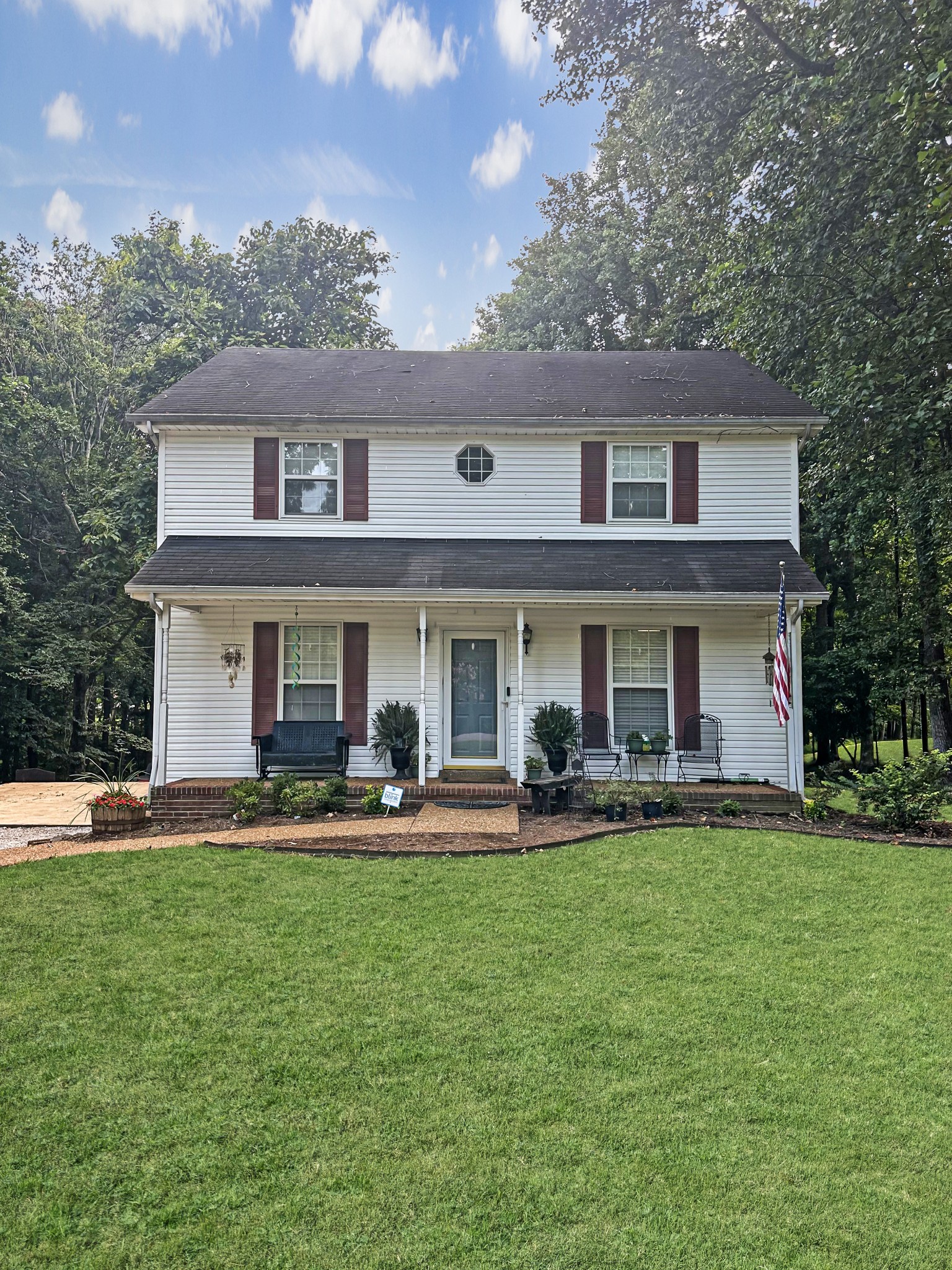 1016 Keyway Drive Pleasant View, TN 37146 - Photo 5 of 30 a front view of a house with patio and yard