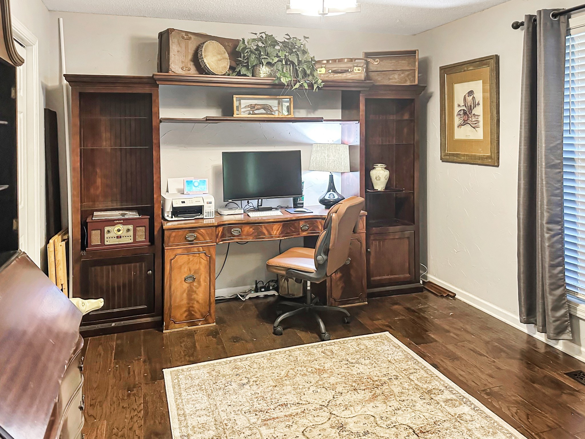 1016 Keyway Drive Pleasant View, TN 37146 - Photo 8 of 30 a view of a workspace with furniture and a flat screen tv