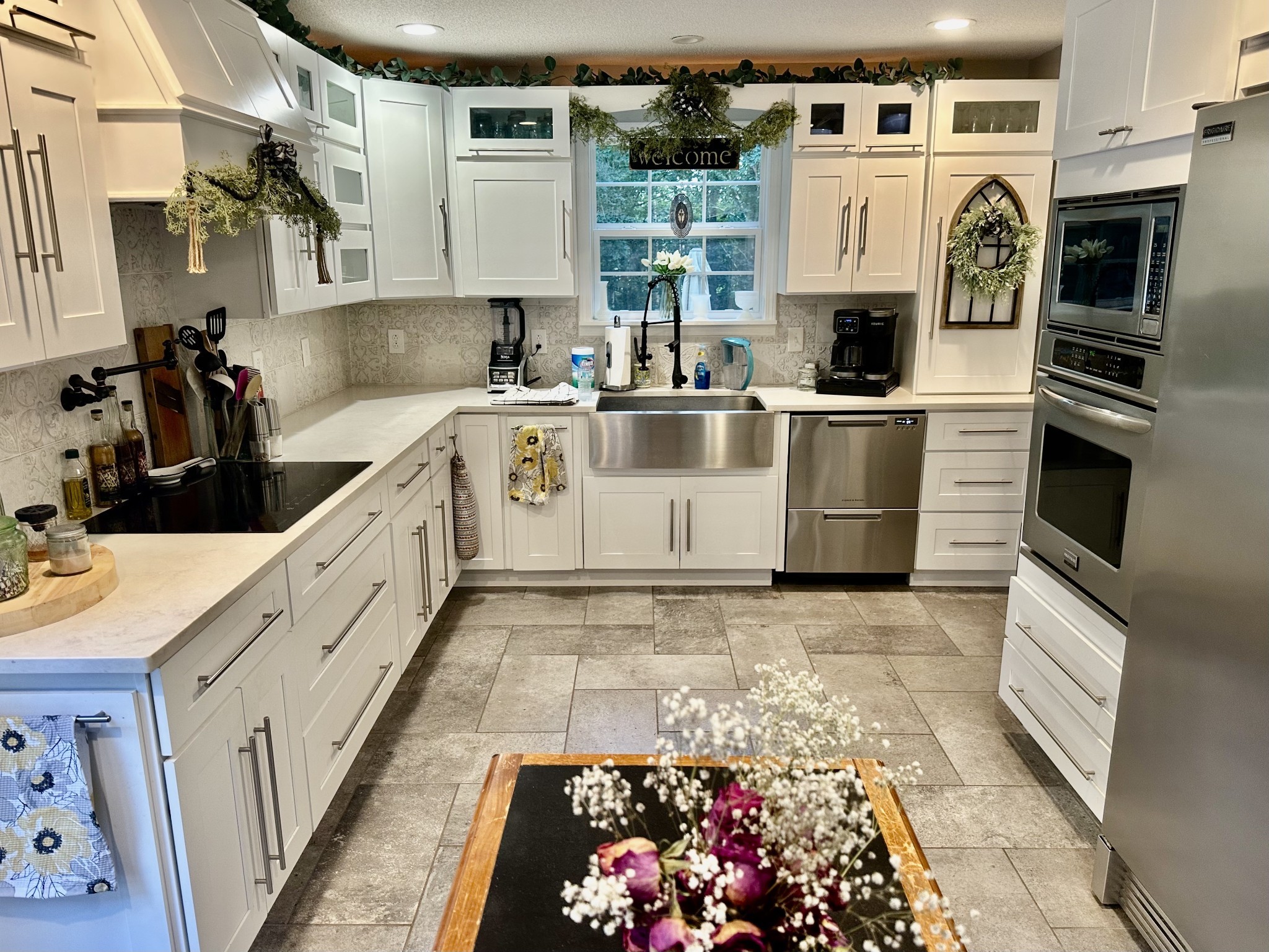 1016 Keyway Drive Pleasant View, TN 37146 - Photo 10 of 30 a kitchen with white cabinets and appliances