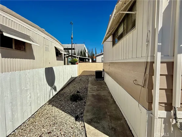a view of a back yard of the house