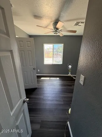 a view of entryway with kitchen