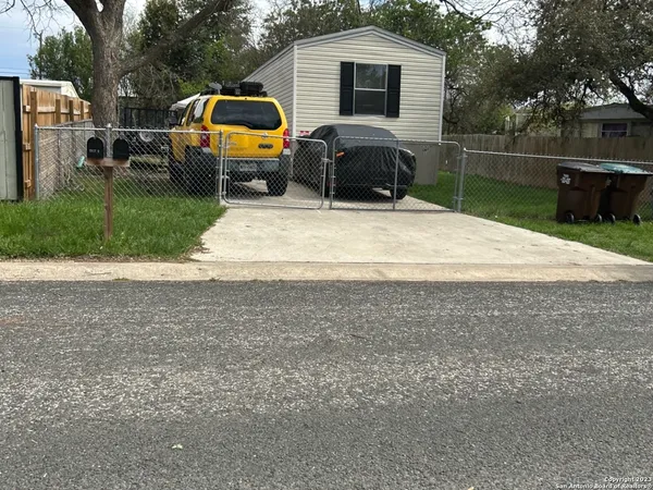 a house view with a garden space