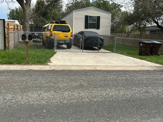 a house view with a garden space