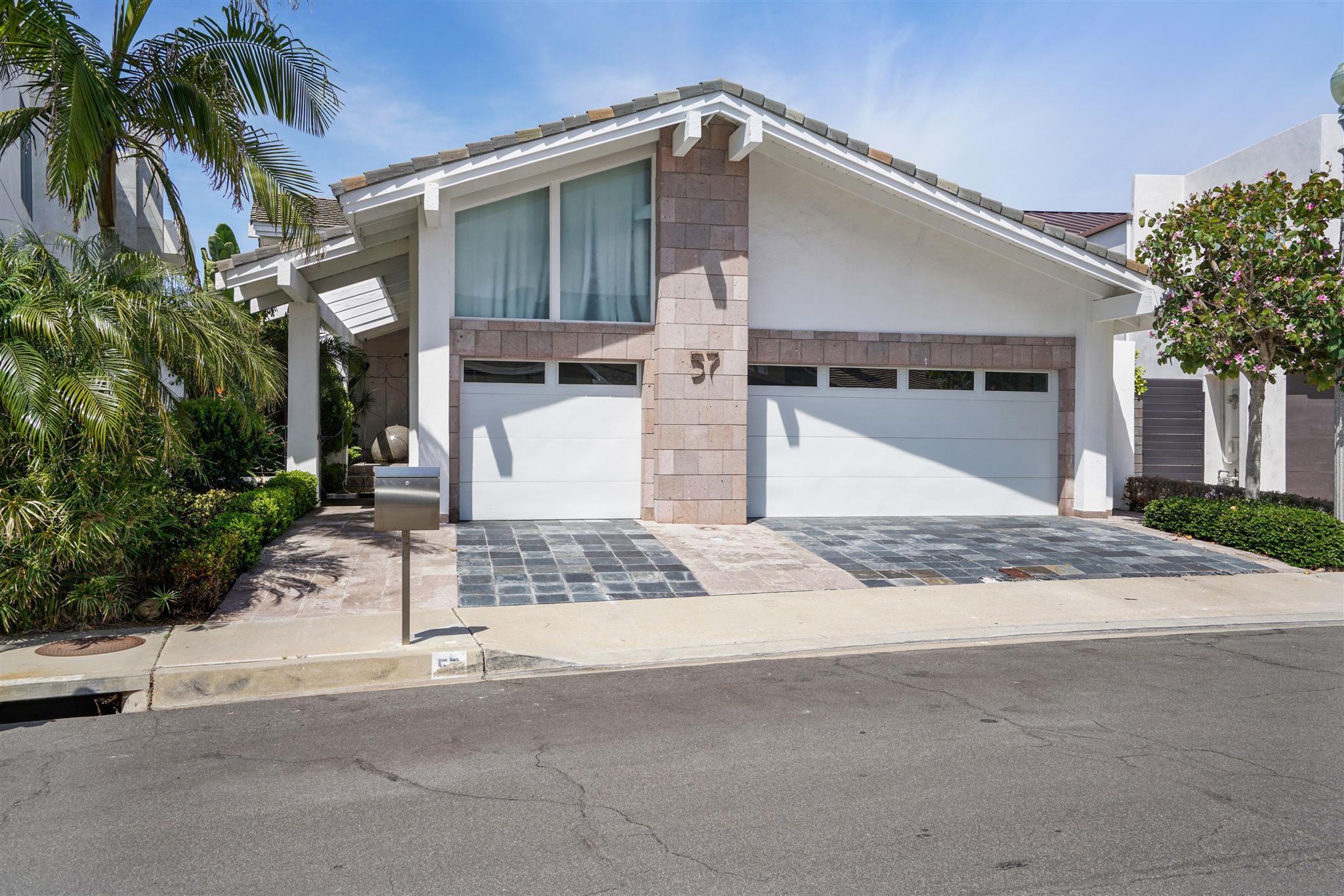 a view of a house with a street