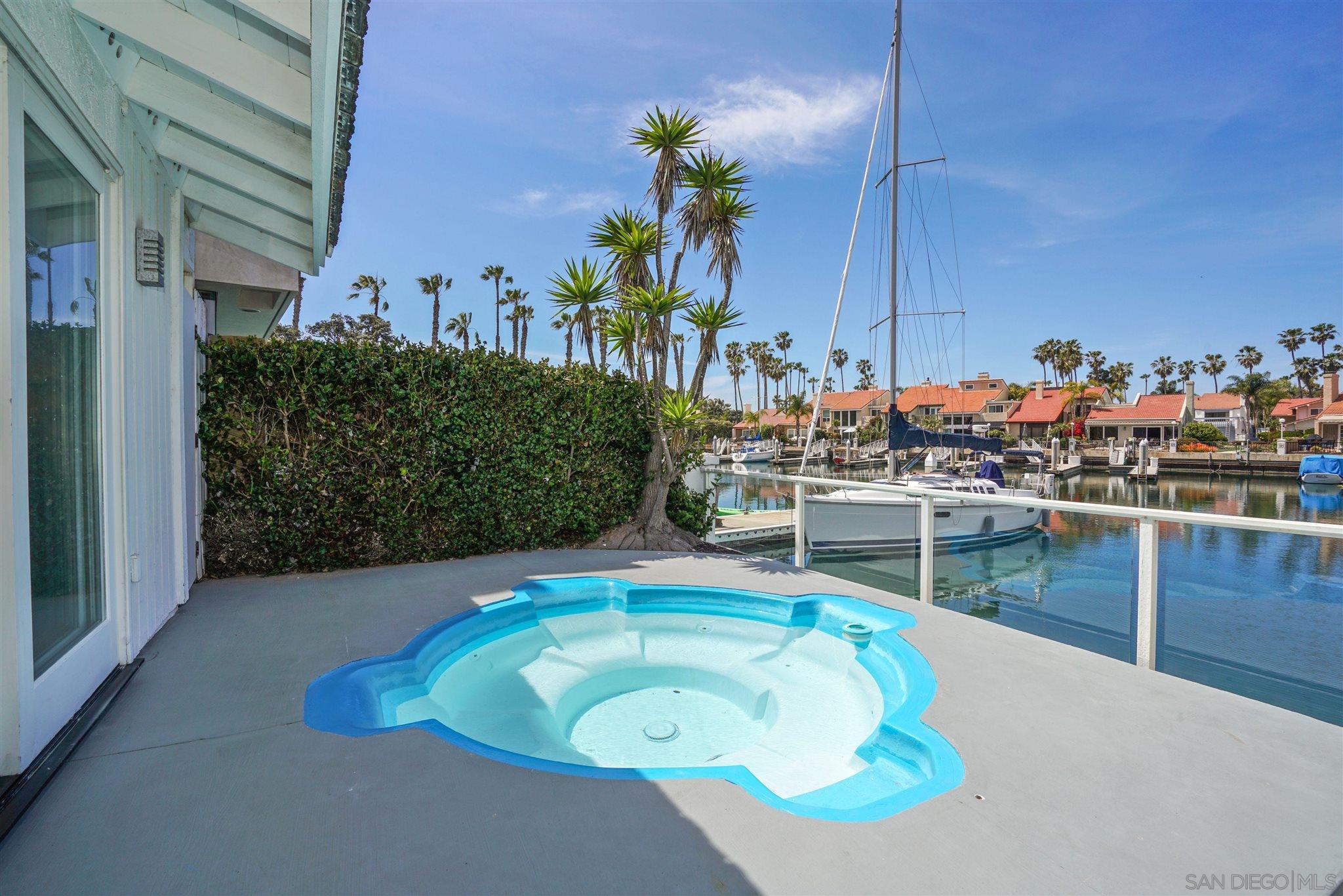 57 Blue Anchor Cay Road Coronado, CA 92118 - Photo 4 of 37 a view of a chairs and table in the terrace