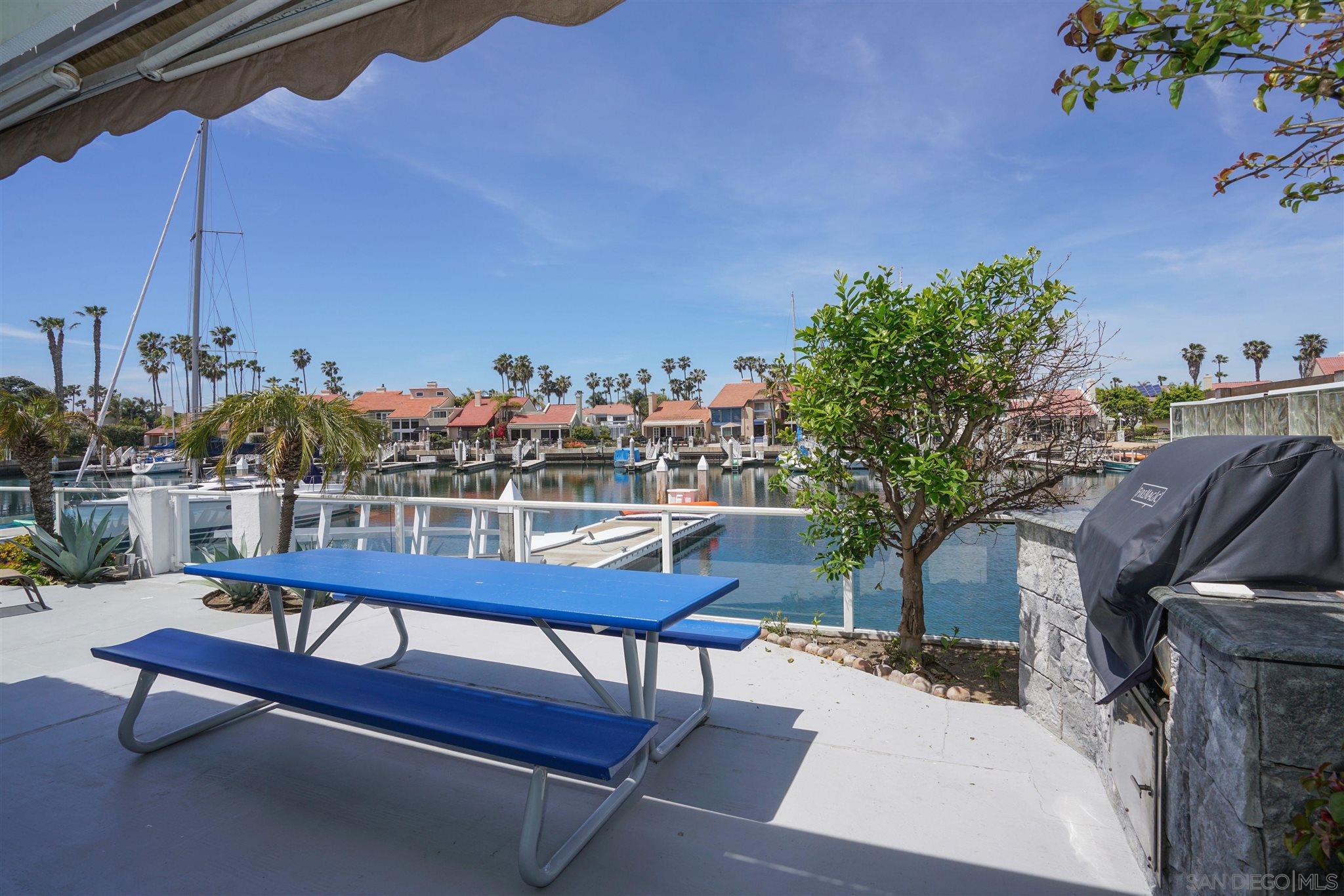 57 Blue Anchor Cay Road Coronado, CA 92118 - Photo 6 of 37 a view of a terrace with chairs
