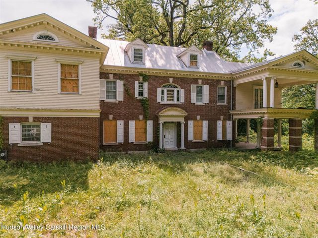 front view of house with a garden