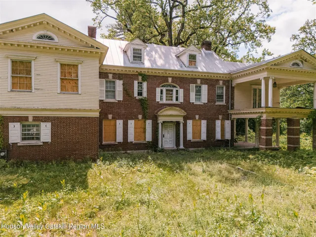 front view of house with a garden