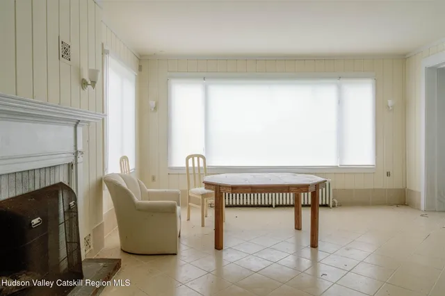 an entryway with wooden floor