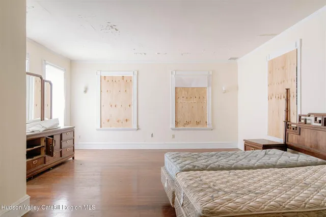 a bath room with a bath tub and a shower